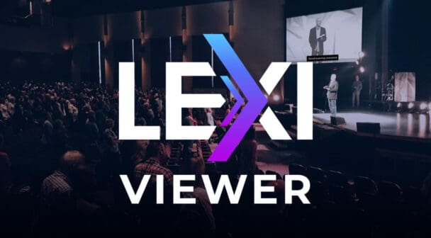 LEXI Viewer logo with live event captioning displayed on a screen during a presentation.